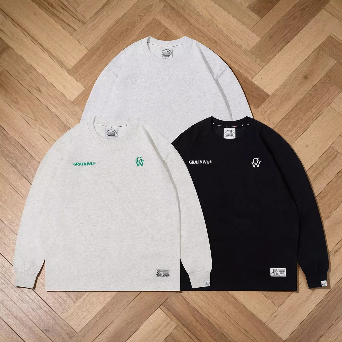 GRAF&WU embroidered long sleeve tees in Gray White, Oat Grey, and Black.